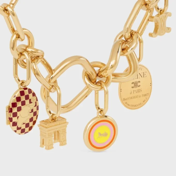 Breloques Médaille Sulky en émail et laiton avec finition dorée