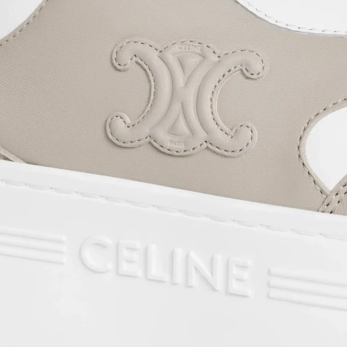 CELINE – Baskets à semelles épaisses avec motif Triomphe en cuir de veau CELINE – Baskets à semelles épaisses avec motif Triomphe en cuir de veau