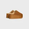 CELINE Dana – Mules à talons compensés en cuir de veau suédé CELINE Dana – Mules à talons compensés en cuir de veau suédé