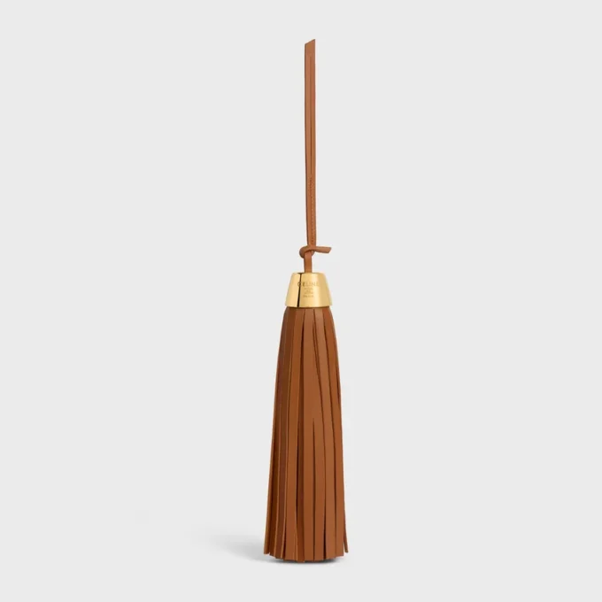 Charm à pompon en cuir d&rsquo;agneau lisse