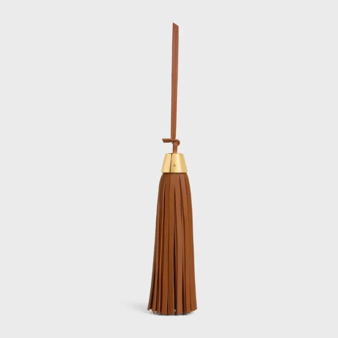 Charm à pompon en cuir d&rsquo;agneau lisse