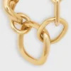 Charms Gourmette moderne et imposante en laiton avec finition dorée Charms Gourmette moderne et imposante en laiton avec finition dorée