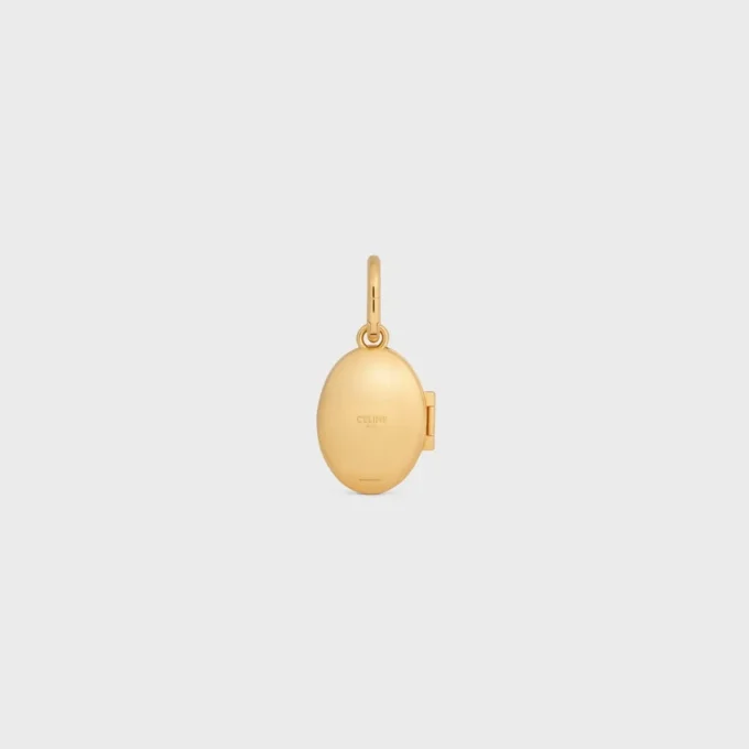 Charms Médaillon Éléphant en laiton avec finition dorée, émail et acier Charms Médaillon Éléphant en laiton avec finition dorée, émail et acier