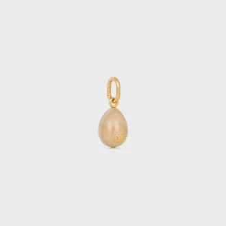 Charms Œuf en pierre Botticino et laiton avec finition dorée Charms Œuf en pierre Botticino et laiton avec finition dorée