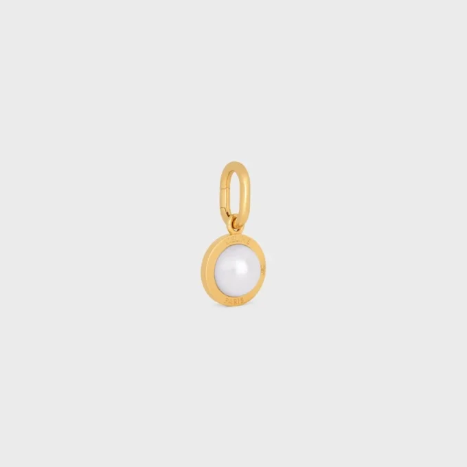 Charms Perle en résine et laiton avec finition dorée