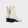 Cheri – Bottines zippées en cuir d’agneau extensible Cheri – Bottines zippées en cuir d’agneau extensible