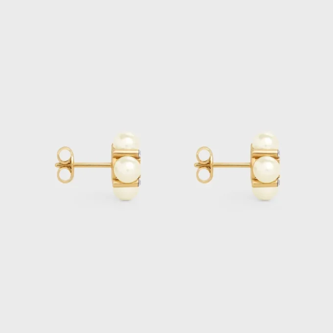 Clous d’oreilles CELINE en strass, perles en résine et laiton avec finition dorée Clous d’oreilles CELINE en strass, perles en résine et laiton avec finition dorée