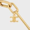 Collier à breloques en laiton avec finition dorée Collier à breloques en laiton avec finition dorée