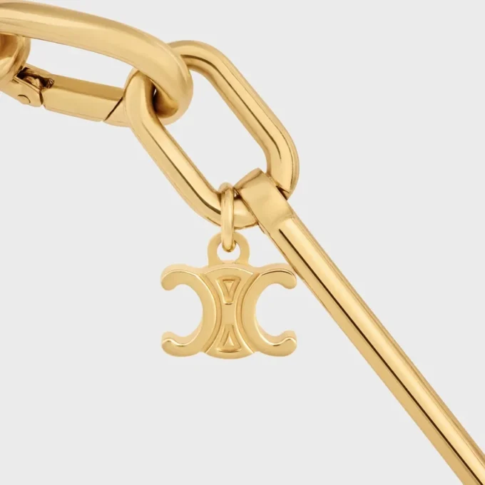 Collier à breloques en laiton avec finition dorée Collier à breloques en laiton avec finition dorée