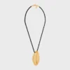 Collier CELINE Dafila en laiton avec finition dorée et soie