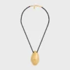 Collier CELINE Dafila en laiton avec finition dorée et soie