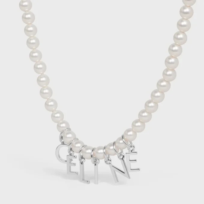 Collier CELINE Monochroms en perles de verre et laiton avec finition rhodiée Collier CELINE Monochroms en perles de verre et laiton avec finition rhodiée