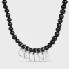 Collier CELINE Monochroms à perles en onyx et laiton avec finition rhodiée Collier CELINE Monochroms à perles en onyx et laiton avec finition rhodiée