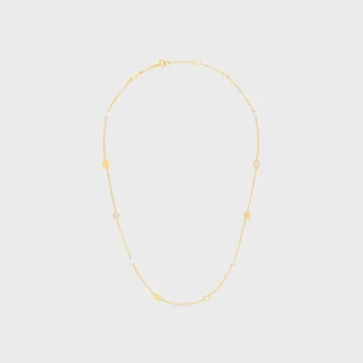 Collier Les Perles CELINE en strass, perles en résine et laiton avec finition dorée