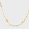 Collier Les Perles CELINE en strass, perles en résine et laiton avec finition dorée