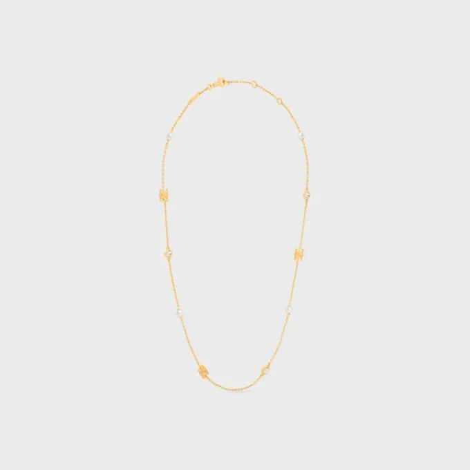 Collier Les Perles CELINE en strass, perles en résine et laiton avec finition dorée
