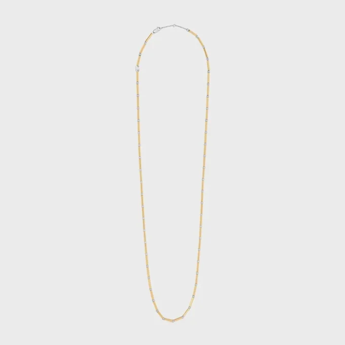 Collier long à breloques en laiton avec finition or et rhodium Collier long à breloques en laiton avec finition or et rhodium