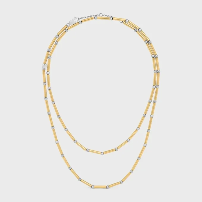 Collier long à breloques en laiton avec finition or et rhodium Collier long à breloques en laiton avec finition or et rhodium