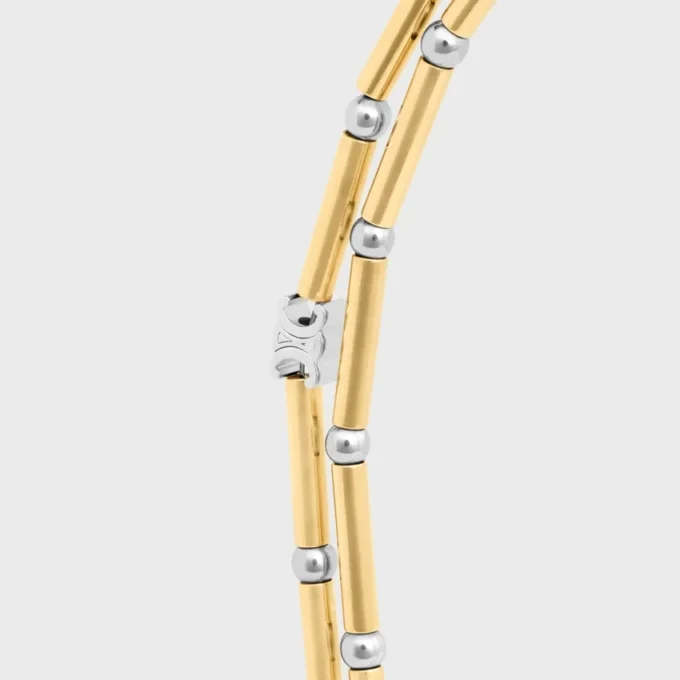 Collier long à breloques en laiton avec finition or et rhodium Collier long à breloques en laiton avec finition or et rhodium