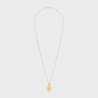 Collier médaillon CELINE en perle de résine et laiton avec finition dorée