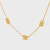 Collier Triomphe Mini Triomphe en laiton avec finition dorée Collier Triomphe Mini Triomphe en laiton avec finition dorée