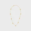 Collier Triomphe Mini Triomphe en laiton avec finition dorée Collier Triomphe Mini Triomphe en laiton avec finition dorée