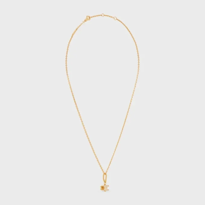 Collier Triomphe Solitaire Sparkle en strass et laiton avec finition dorée