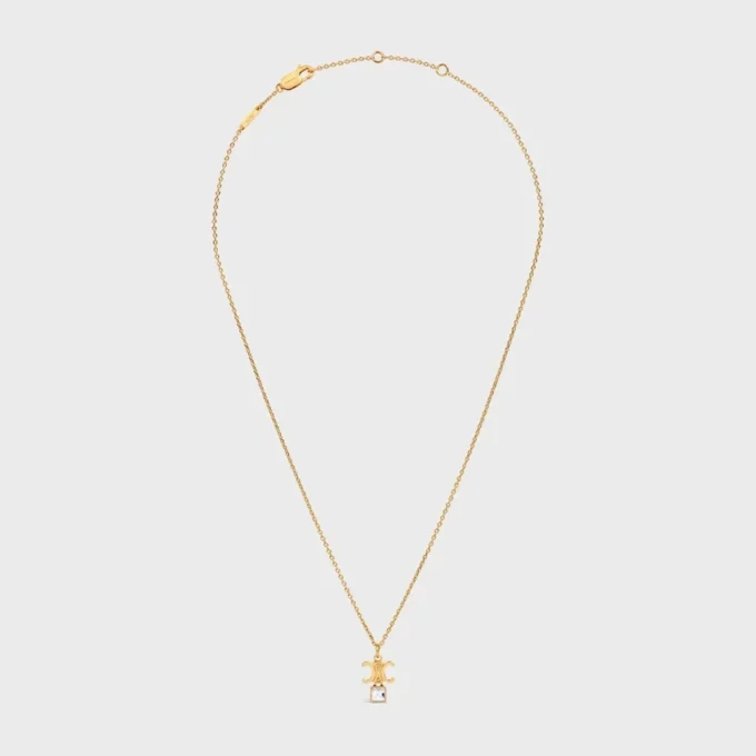 Collier Triomphe Twinkle en strass et laiton avec finition dorée Collier Triomphe Twinkle en strass et laiton avec finition dorée