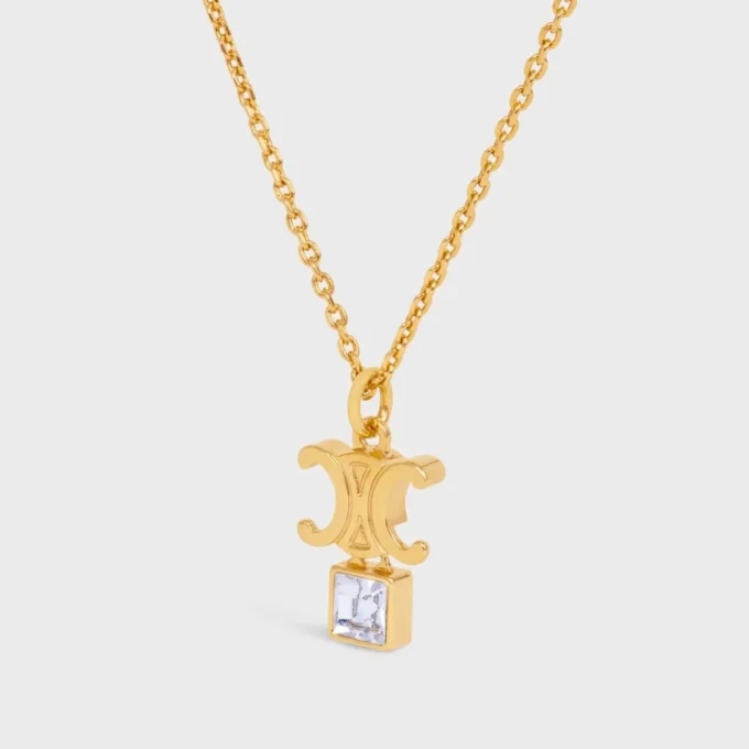 Collier Triomphe Twinkle en strass et laiton avec finition dorée Collier Triomphe Twinkle en strass et laiton avec finition dorée