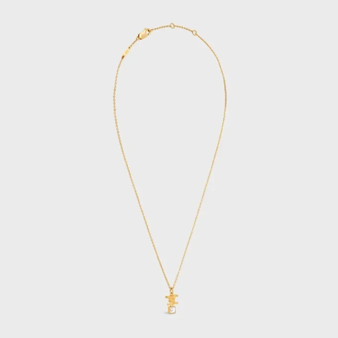 Collier Triomphe Twinkle en strass et laiton avec finition dorée Collier Triomphe Twinkle en strass et laiton avec finition dorée