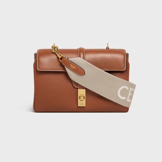 Courte bandoulière en laine avec jacquard CELINE et finitions dorées Courte bandoulière en laine avec jacquard CELINE et finitions dorées