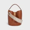 Courte bandoulière en laine avec jacquard CELINE et finitions dorées Courte bandoulière en laine avec jacquard CELINE et finitions dorées