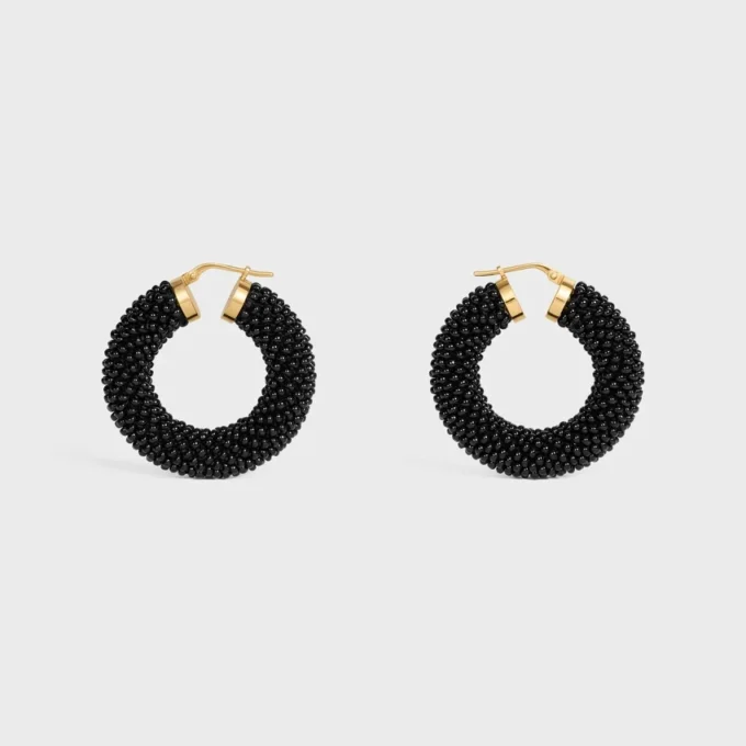 Créoles CELINE Dafila en perles de verre et laiton avec finition dorée Créoles CELINE Dafila en perles de verre et laiton avec finition dorée