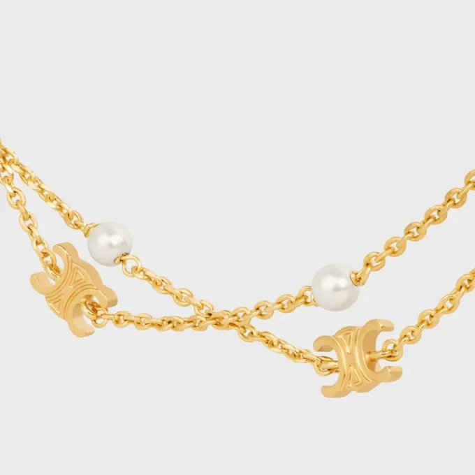 Double collier Triomphe Pearl en laiton avec finition dorée et perles en résine