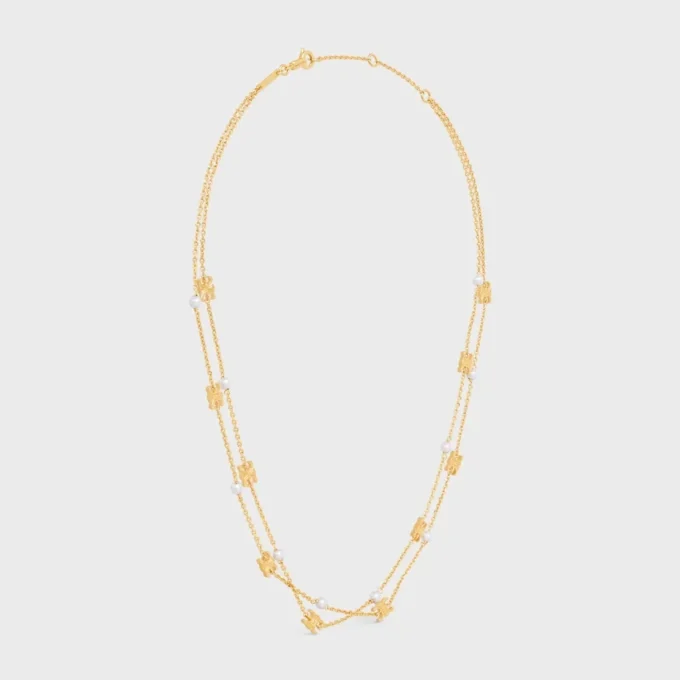 Double collier Triomphe Pearl en laiton avec finition dorée et perles en résine