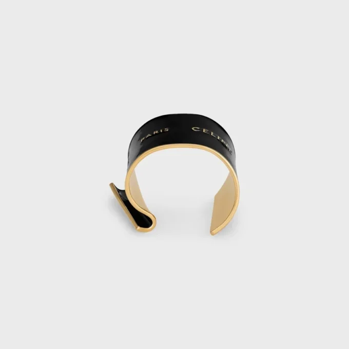 Grand bracelet manchette CELINE Ribbon en émail et laiton avec finition dorée