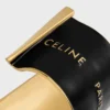 Grand bracelet manchette CELINE Ribbon en émail et laiton avec finition dorée