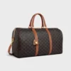 Grand sac de voyage en Triomphe Canvas et cuir de veau Grand sac de voyage en Triomphe Canvas et cuir de veau