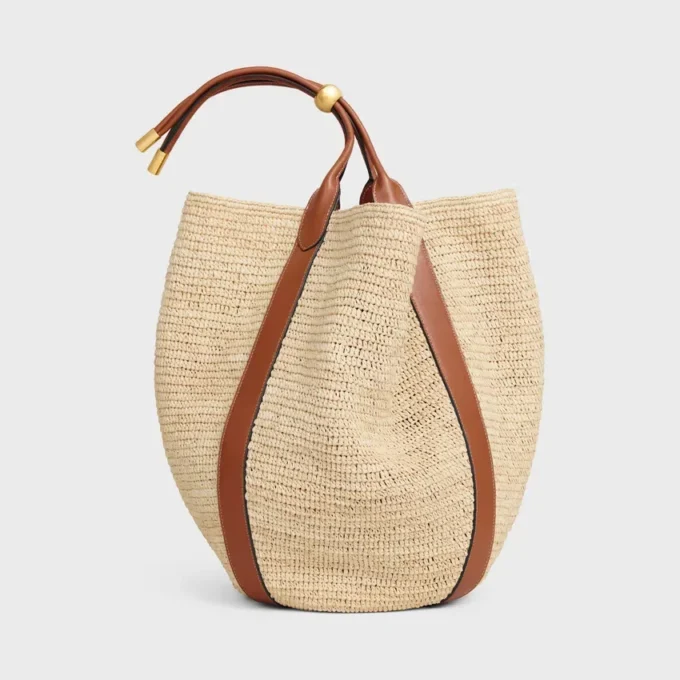 Grand sac seau en raphia et cuir de veau Grand sac seau en raphia et cuir de veau