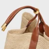 Grand sac seau en raphia et cuir de veau Grand sac seau en raphia et cuir de veau