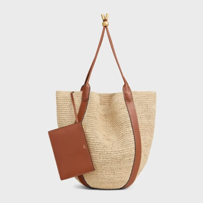 Grand sac seau en raphia et cuir de veau Grand sac seau en raphia et cuir de veau