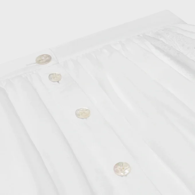 Jupe midi brodée en coton cambric Jupe midi brodée en coton cambric