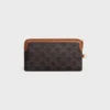 Longue pochette avec bandoulière en Triomphe Canvas et cuir de veau