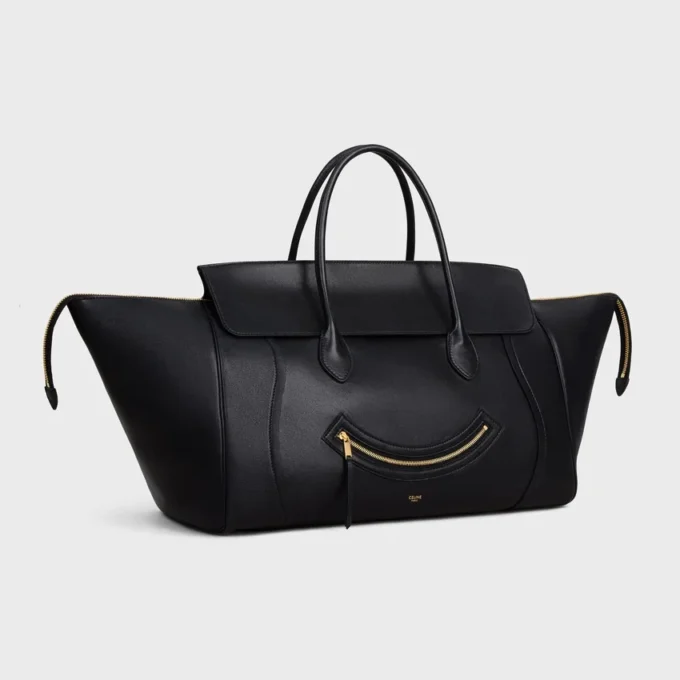 Luggage Big Smile en cuir d’agneau souple et brillant Luggage Big Smile en cuir d’agneau souple et brillant