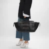 Luggage en cuir d&rsquo;agneau souple et brillant