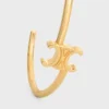 Manchette asymétrique Triomphe en laiton avec finition dorée Manchette asymétrique Triomphe en laiton avec finition dorée