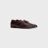 Mocassins CELINE Malaquais Penny Triomphe en cuir de taureau verni
