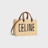 Panier CELINE Paris en raphia et cuir de veau Panier CELINE Paris en raphia et cuir de veau