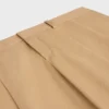 Pantalon à plis en toile de coton