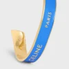 Petit bracelet CELINE Ribbon en émail et laiton avec finition dorée